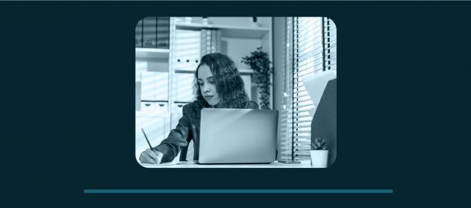 Image - woman working at desk with computer