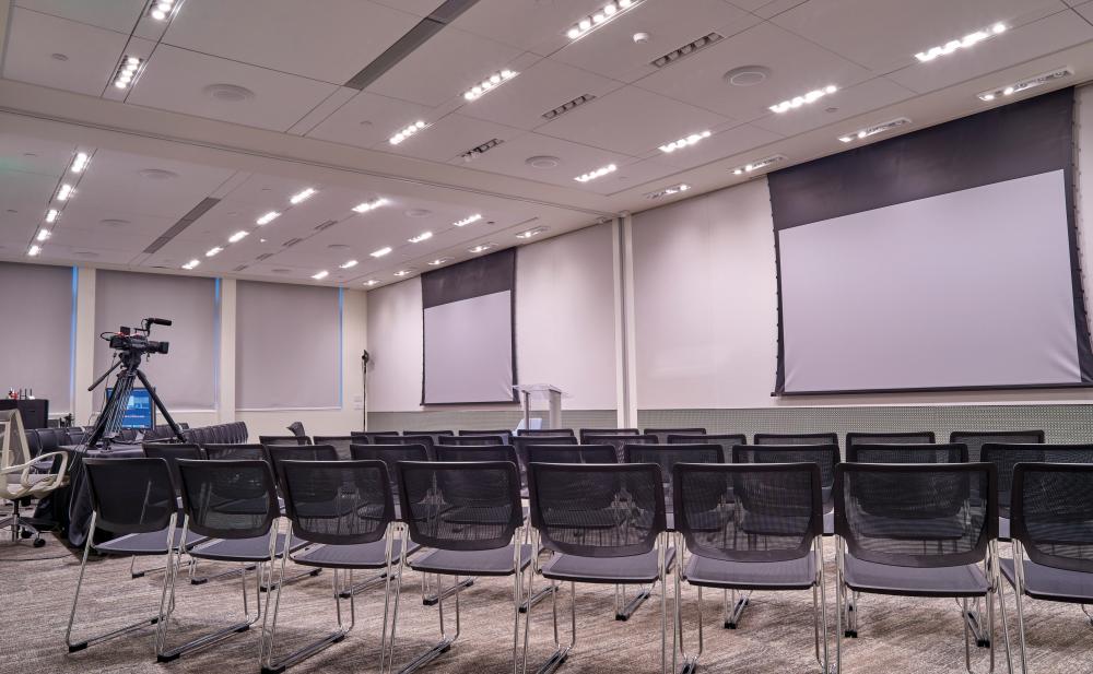 Toni Rembe Rock multipurpose meeting room, empty audience seating, facing the stage