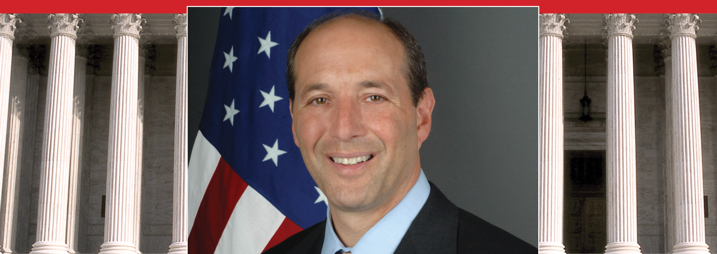 Bluff Justice: Jeff Bleich on How to Fight Trump’s Court Subjugation Plan Image - the speaker and columns from a court building