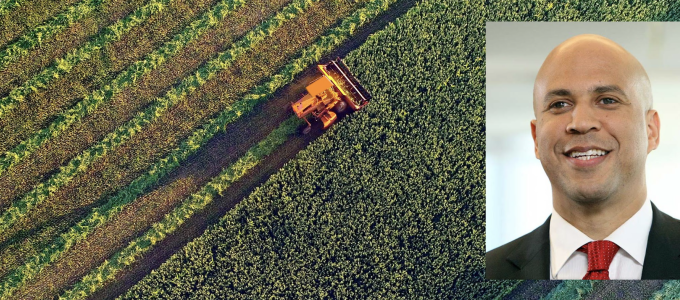 Image - Cory Booker and a tractor on a farm