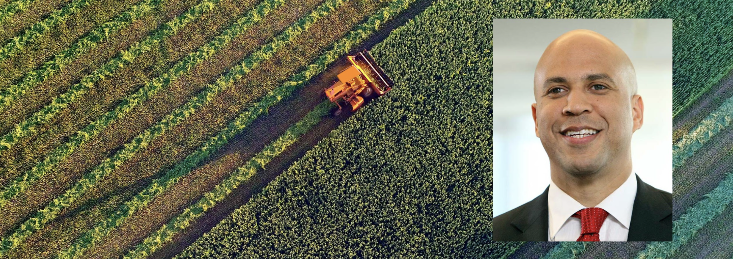 Image - Cory Booker and a tractor on a farm